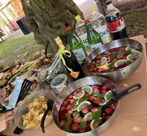 a buffe table with food and drinks